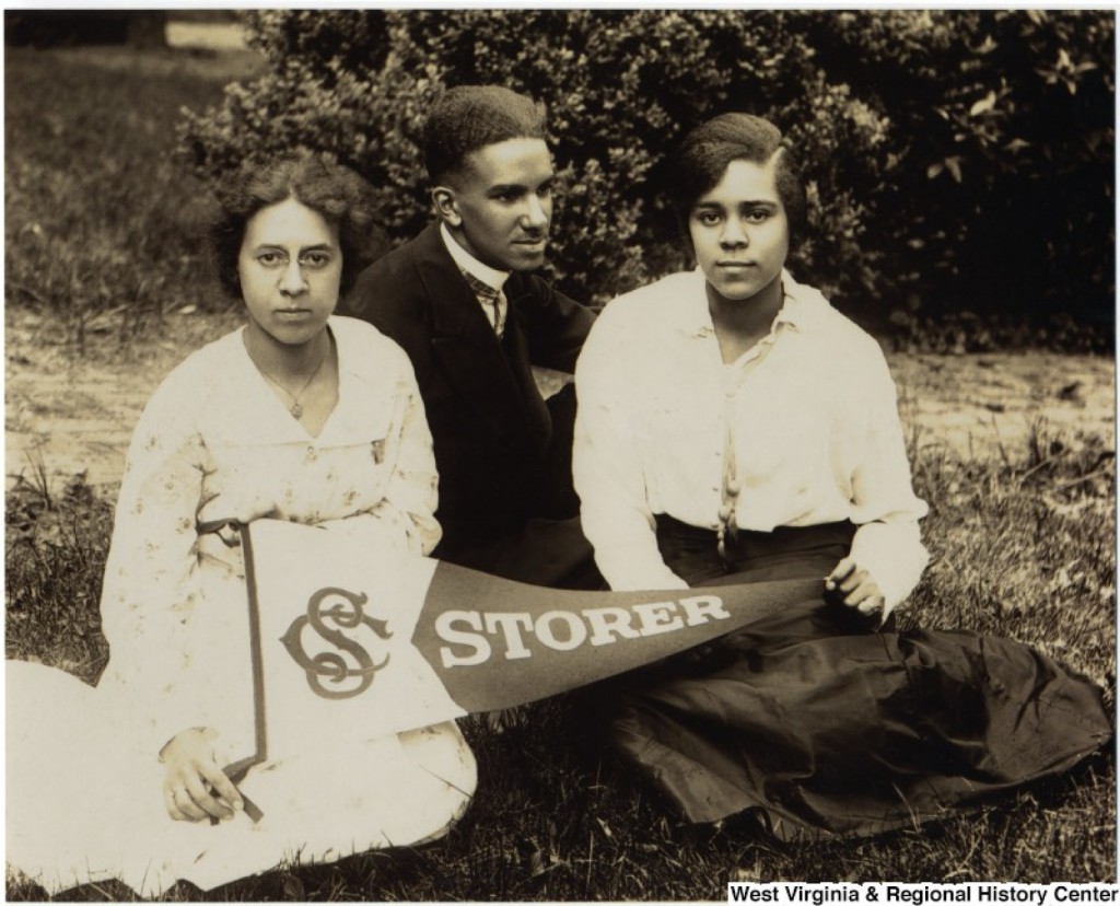 In 1865, a primary school for former slaves was started in historic Harpers Ferry, W. Va. By 1867 it became Storer College, and ultimately a sanctuary for young African Americans. Storer was one of the many schools that opened after the Civil War to educate a population that had been legally denied a chance to learn. Above, students Isabelle Stewart, Raymond McNeal and Odetta Johnson hold a school pennant in 1917. (West Virginia and Regional History Center)